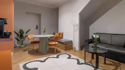 Area soggiorno di Musto Boutique Apartments