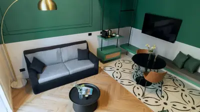 TV o dispositivi per l'intrattenimento presso Musto Boutique Apartments