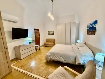 Letto o letti in una camera di Casa delle Carrozze