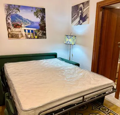 Letto o letti in una camera di Casa delle Carrozze