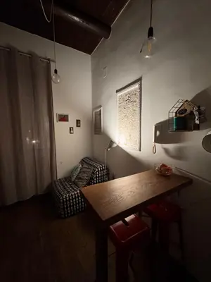 Area soggiorno di Casarià Holiday Home, Nel Cuore del Centro Storico di Napoli