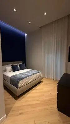 Letto o letti in una camera di Angel Suite Chiaia