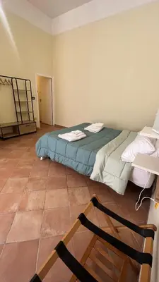 Letto o letti in una camera di Casa Castagna