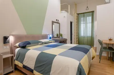 Letto o letti in una camera di Giantri Home Spaccanapoli Metro Duomo centro storico Napoli sotterranea Crist velato Cappella Sansevero a 5 min dal porto