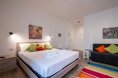 Letto o letti in una camera di Eleven11 Naples