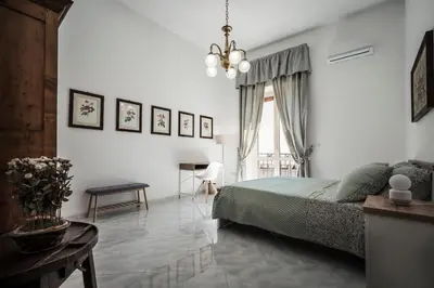 Letto o letti in una camera di Santa Teresa Belvedere