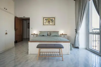 Letto o letti in una camera di Santa Teresa Belvedere