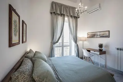 Letto o letti in una camera di Santa Teresa Belvedere