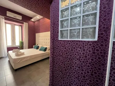 Letto o letti in una camera di Nereides Guest House