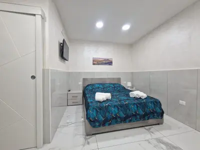 Letto o letti in una camera di Stella Home