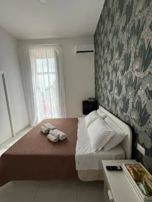 Letto o letti in una camera di OIVITA by LUGANI B&B COLLECTION