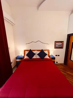 Letto o letti in una camera di Parthenope b&b