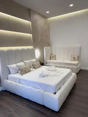 Letto o letti in una camera di Kairos Relais