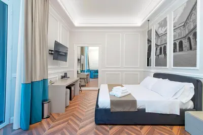 Letto o letti in una camera di Naples Plaza Duomo