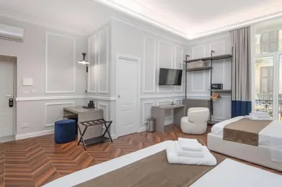 Letto o letti in una camera di Naples Plaza Duomo