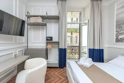 Letto o letti in una camera di Naples Plaza Duomo