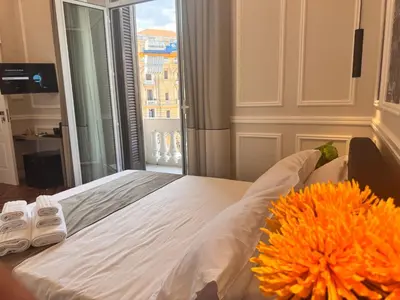 Letto o letti in una camera di Naples Plaza Duomo