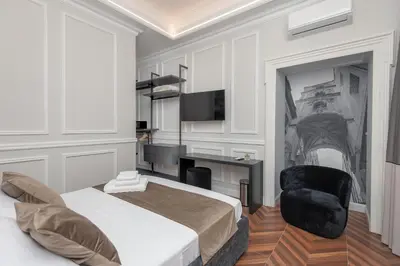 Letto o letti in una camera di Naples Plaza Duomo