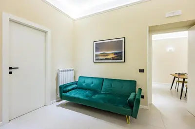 Area soggiorno di Modern Spacious Apartment in the Heart of Naples