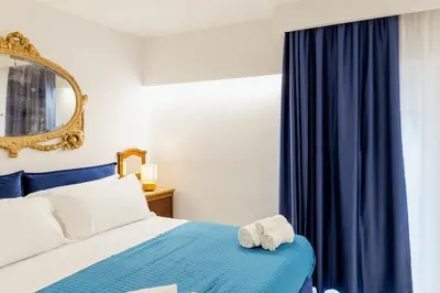 Letto o letti in una camera di Atri Rooms Centro Storico Napoli
