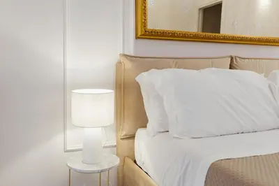 Letto o letti in una camera di Atri Rooms Centro Storico Napoli