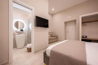 Letto o letti in una camera di Madame Toledo Luxury Rooms