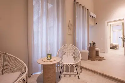 Area soggiorno di Madame Toledo Luxury Rooms