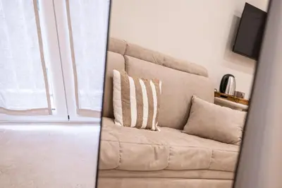 Area soggiorno di Madame Toledo Luxury Rooms