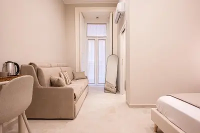 Area soggiorno di Madame Toledo Luxury Rooms