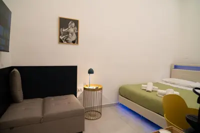 Letto o letti in una camera di Dimora Merliani