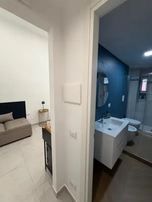 Letto o letti in una camera di Dimora Merliani