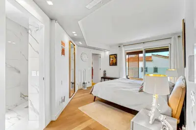 Letto o letti in una camera di Appartamento Ponisio