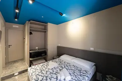 Letto o letti in una camera di Mia Suites Angioino