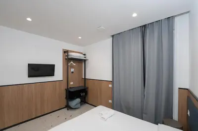 Letto o letti in una camera di Mia Suites Angioino