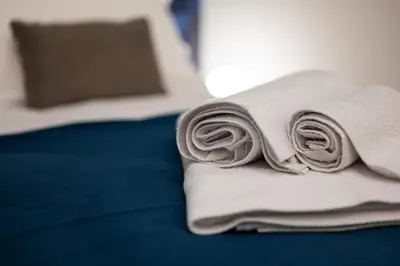 Letto o letti in una camera di Na'more Rooms