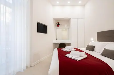 Letto o letti in una camera di Na'more Rooms