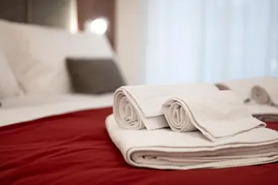 Letto o letti in una camera di Na'more Rooms