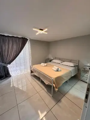 Letto o letti in una camera di Nel cuore di Napoli