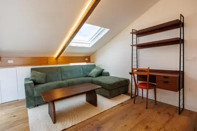Area soggiorno di Exclusive Spaccanapoli Penthouse-Terrace with Lift By HouseinNaples