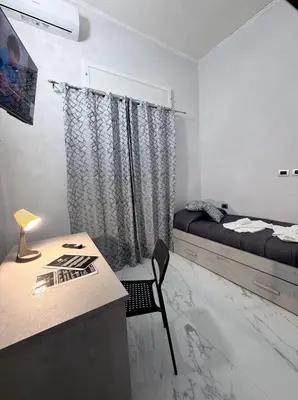 Letto o letti in una camera di b&b Ciuculill