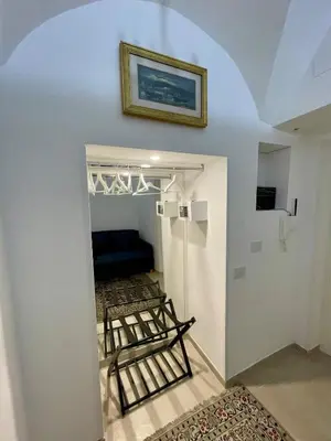 Letto o letti in una camera di Vico Inn