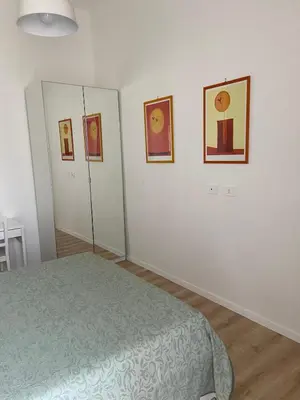 Letto o letti in una camera di Paladino al Centro