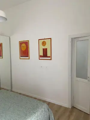 Letto o letti in una camera di Paladino al Centro