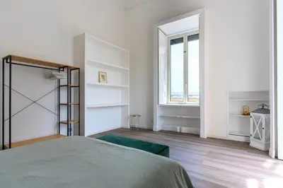 Letto o letti in una camera di Live Napoli! Top Central Spacious Apartment La Casa Di Marina
