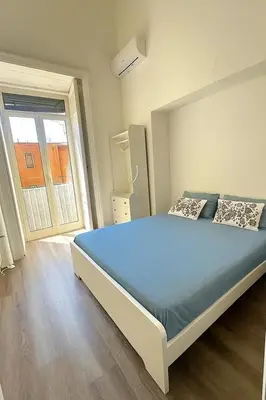 Letto o letti in una camera di Live Napoli! Top Central Spacious Apartment La Casa Di Marina