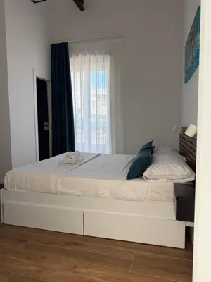 Letto o letti in una camera di Storico 31 Stanze ai Quartieri Spagnoli