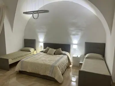 Letto o letti in una camera di Casa Esposito