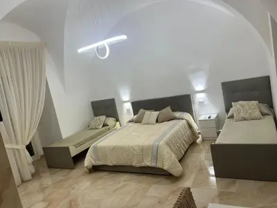 Letto o letti in una camera di Casa Esposito