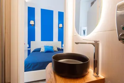Letto o letti in una camera di Maison Lulu - Naples Old Town