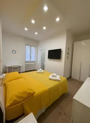 Letto o letti in una camera di CIAO PARTENOPE - luxury rooms
